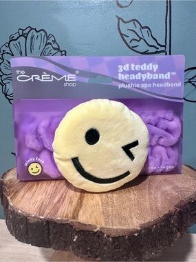 the CRÈME Shop Plush Winky Face Teddy Headband - Yellow